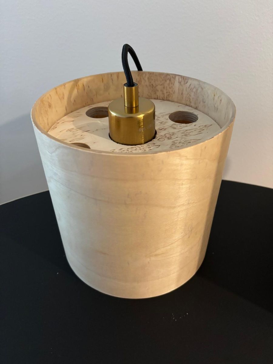 Looking into the shade from above: brass lamp holder set in a curly birch top plate